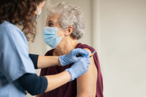 Elderly Lady Getting Covid-19 Vaccine 