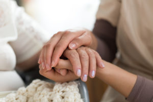 Caregiver Holding Hand 