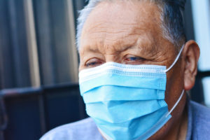 Man in Disposable Mask