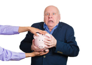 Old Man with Someone Trying to Take Piggy Bank