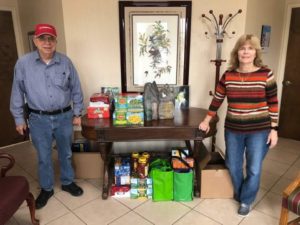 John and Paula with Food Donations 