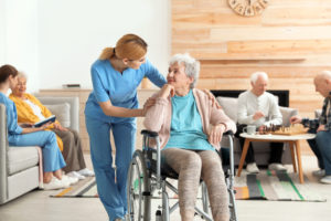 Nurse and Elderly Woman in Wheelchair 