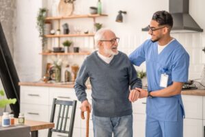 Medicaid worker helping elderly patient 